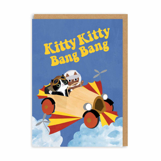 Greeting card with 2 cats in a flying car and text that reads Kitty Kitty Bang Bang
