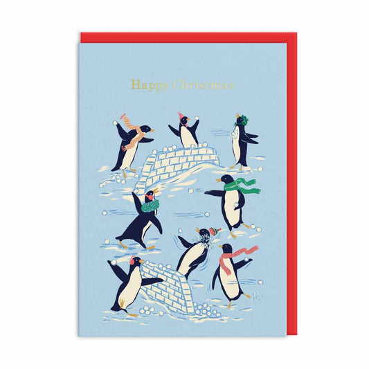 Christmas Card with penguins having a snowball fight. Text reads Happy Christmas, finished in Gold Foil
