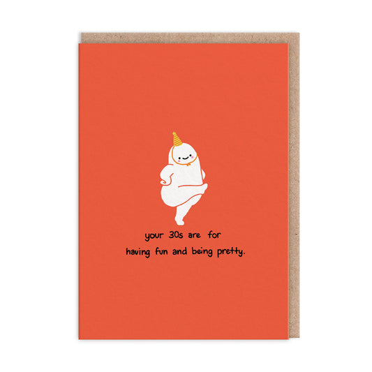 Solid red card, with a nude dancing illustration wearing a party hat. Text read '"your 30s are for having fun and being pretty"